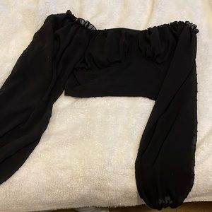 Black crop top zips on the side, texture pattern size large from shein.